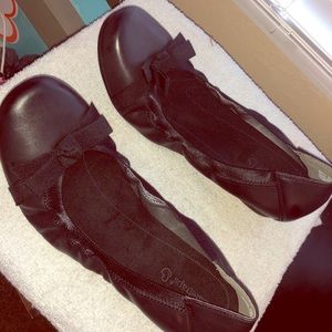 Black slightly wedged flats